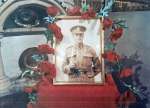 A close-up of the photo of Arthur Whiting in the tribute at Stisted Church. Arthur, from Peldon, died in WW1. His brother Vic Whiting moved to Stisted to farm and it is Vic's descendants who remembered Arthur on Armistice by making this display.  OJR_073